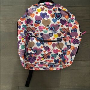 Heart themed back pack new with tags. Retail $89 plus tax